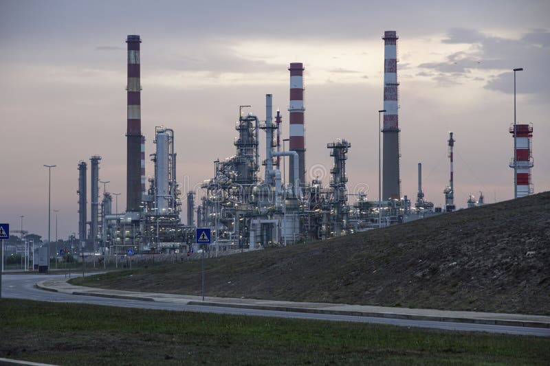 Oil Refinery by the Street at Dawn Stock Image Image of clouds, light