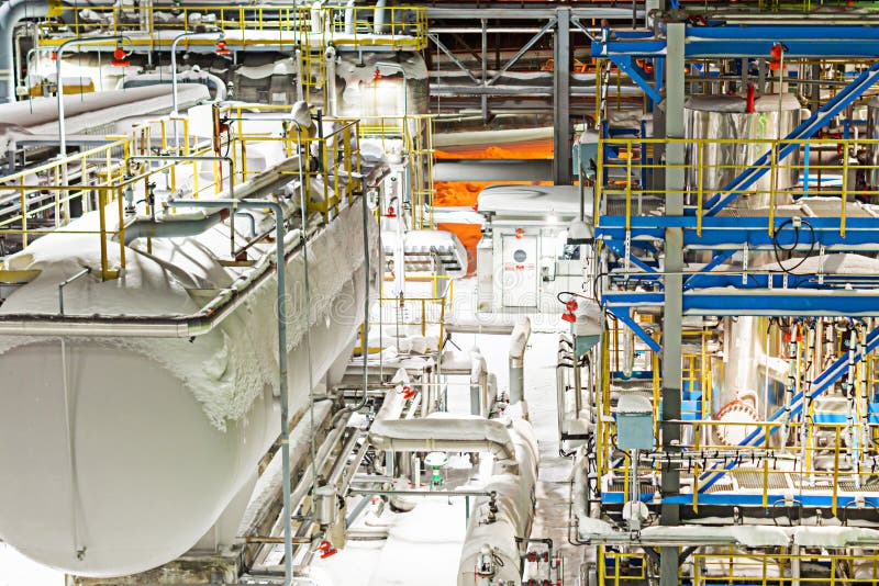 Part of the gas processing plant operates at night. stock photography
