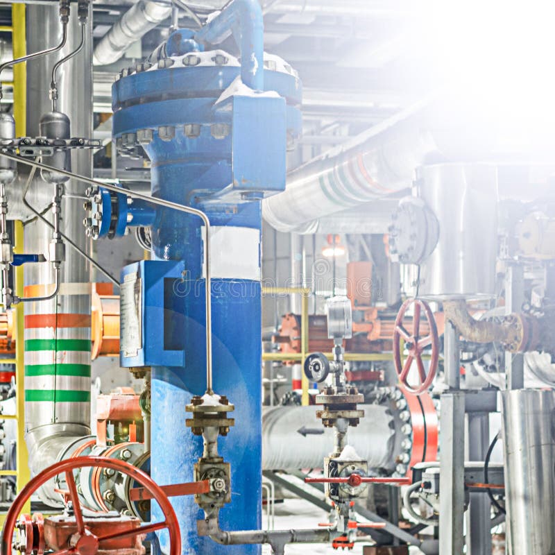 Part of the gas processing plant operates at night. stock photos