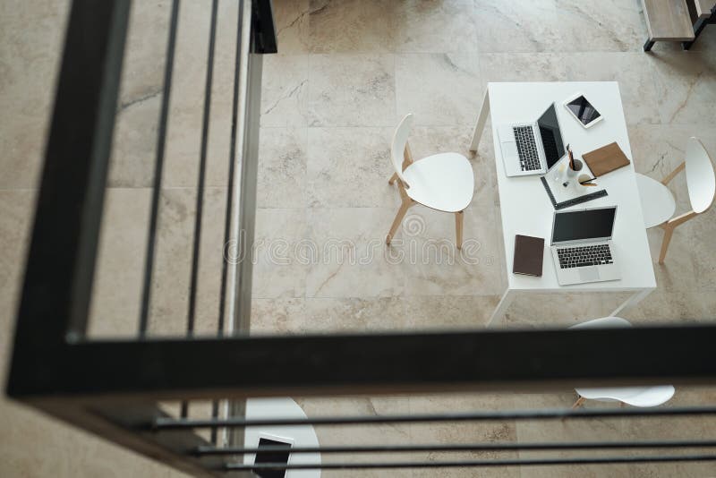 Part of large modern office with table and chairs in the center royalty free stock photos