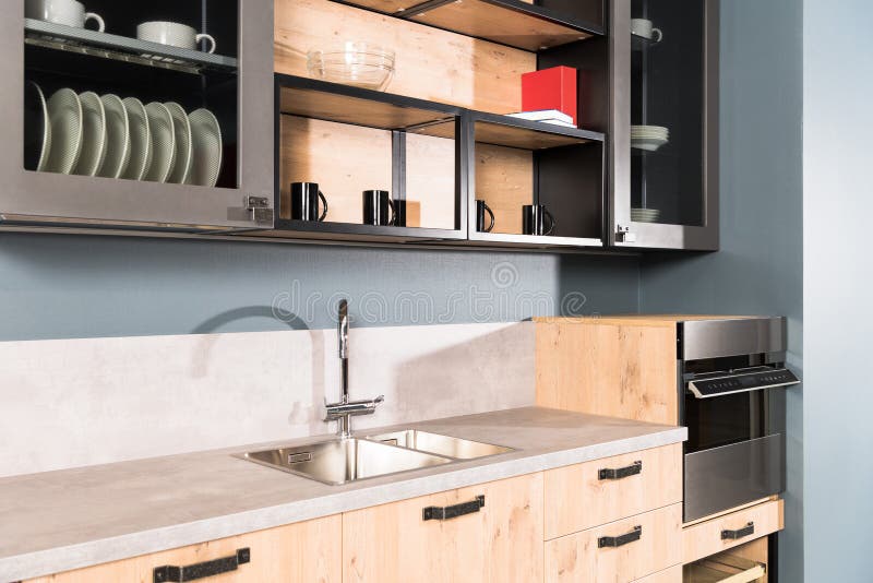 part of modern clean light kitchen with sink tap and shelves royalty free stock photos part of modern clean light kitchen with sink tap and shelves royalty free stock photos