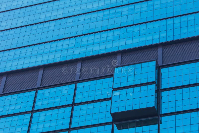 Part of modern design blue glass building exterior