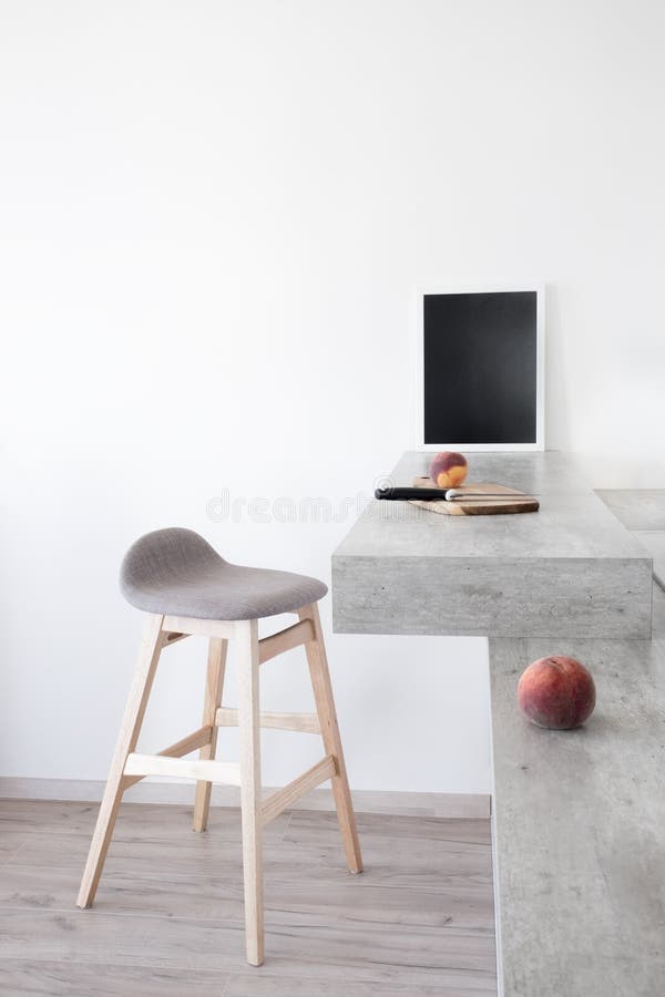 Part of modern scandinavian style kitchen: bar counter with bar counter and peaches. royalty free stock photo Part of modern scandinavian style kitchen: bar counter with bar counter and peaches. royalty free stock photo