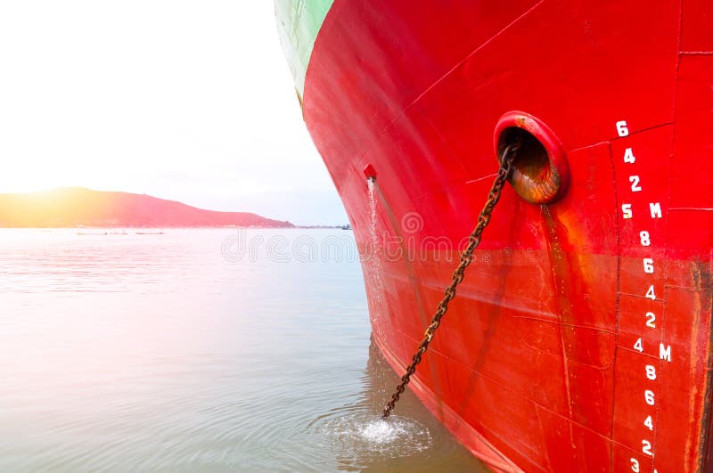 Part of ship Large cargo ship with many shipping container in harbor stock photography