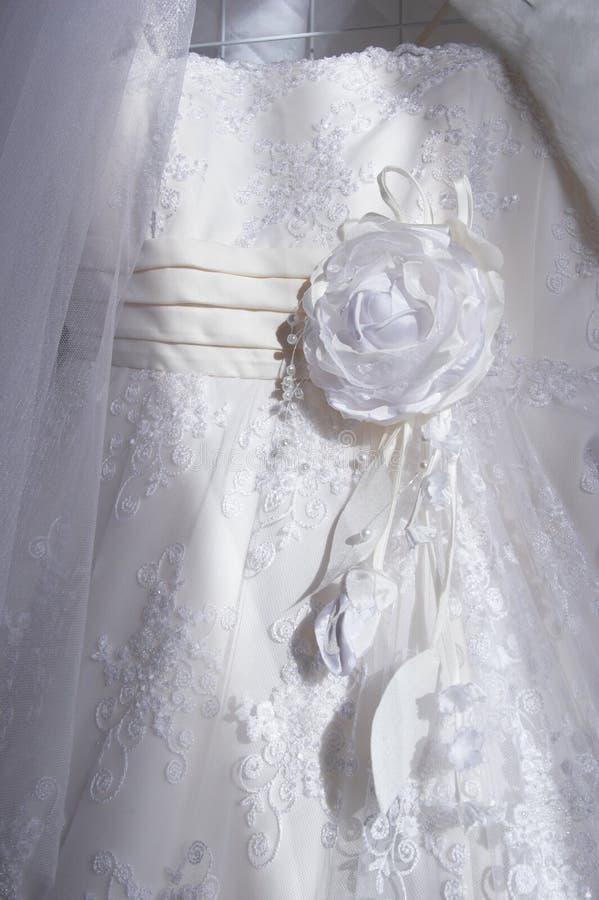 Part of a white dress for wedding decorated