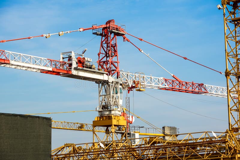 Part Of Yellow Construction Tower Crane Arm Against Blue Sky Stock Image - Image of heavy, steel