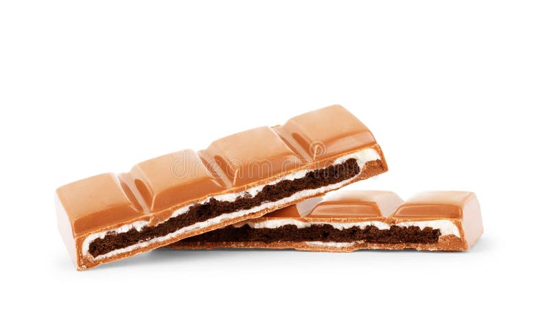 Partes do chocolate de leite no fundo branco foto de stock Partes do chocolate de leite no fundo branco foto de stock
