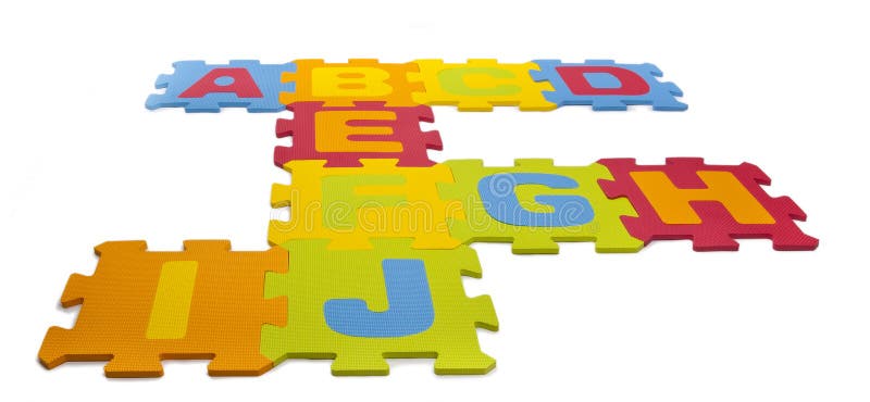 Pezzi del Puzzle dell'Alfabeto immagini stock