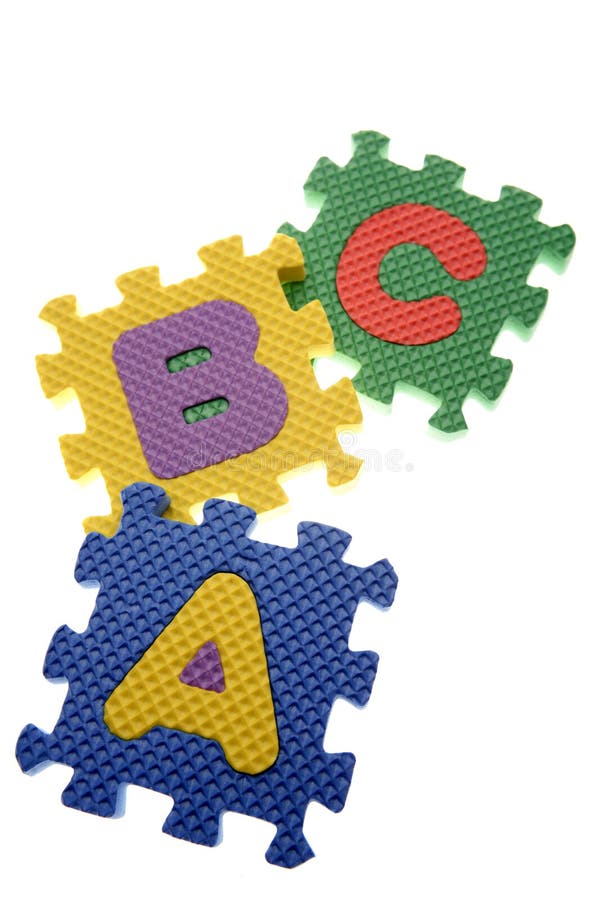 Pezzi del puzzle dell'alfabeto immagini stock libere da diritti