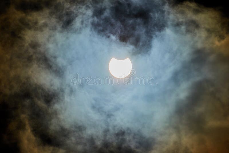 Solar Eclipse on a Cloudy Day. Stock Image Image of landscape