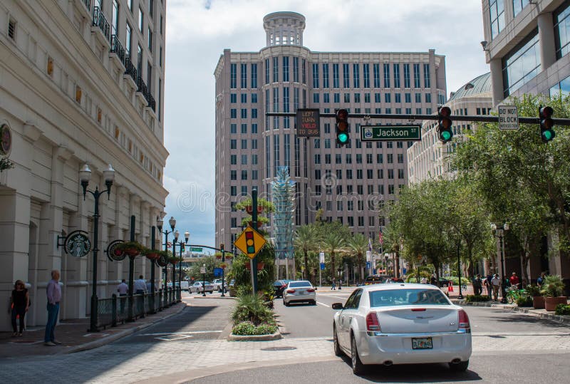Partial view of Orange Ave. , Grand Bohemian Hotel and Orlando City Hall at downtown area 24. Orlando, Florida. August 17, 2019. Partial view of Orange Ave stock photos Partial view of Orange Ave. , Grand Bohemian Hotel and Orlando City Hall at downtown area 24. Orlando, Florida. August 17, 2019. Partial view of Orange Ave stock photos