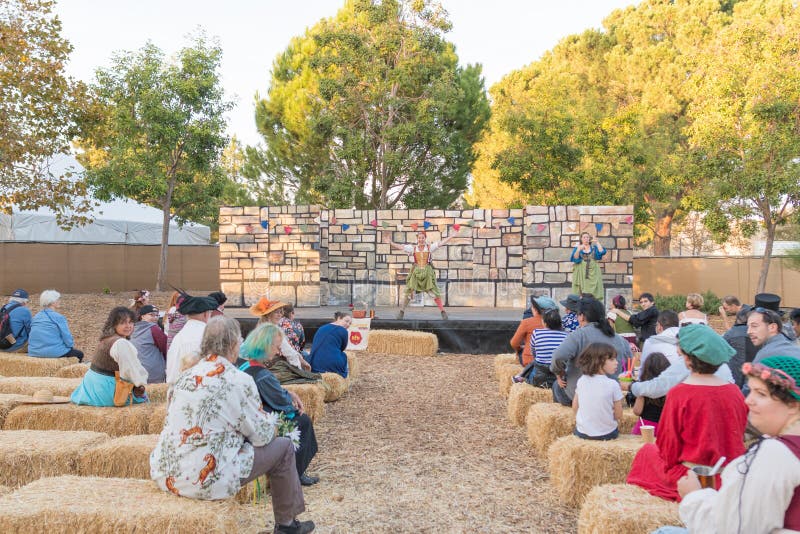 Participant wearing typical clothes during outdoor theater