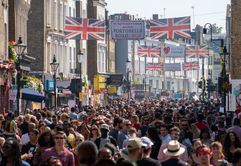Participantes de la 53ª edición del Carnaval de Notting Hill en Portobello Road imagen de archivo