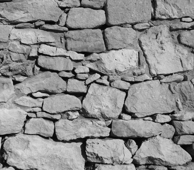 Particolare antico della parete della roccia fotografia stock Particolare antico della parete della roccia fotografia stock