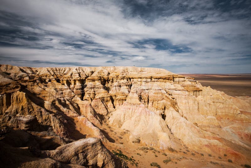 The flaming cliffs of Bayanzag, a region in the Gobi desert of Mongolia famous for discoveries of dinosaur fossils and the first set of dinosaur eggs. The flaming cliffs of Bayanzag, a region in the Gobi desert of Mongolia famous for discoveries of dinosaur fossils and the first set of dinosaur eggs.