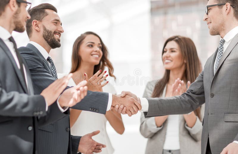 Business partners shaking hands .the concept of cooperation. Business partners shaking hands .the concept of cooperation