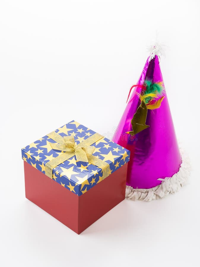 Party hat with gift box stock photo. Image of confetti 77384792