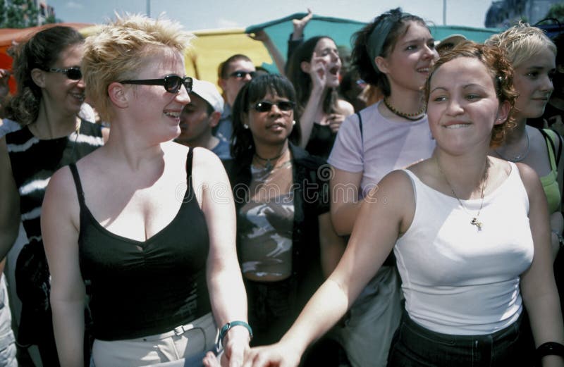 PARIS, France- the Gay Pride March, French Female Teenagers Dancing Together. PARIS, France- the Gay Pride March, French Female Teenagers Dancing Together