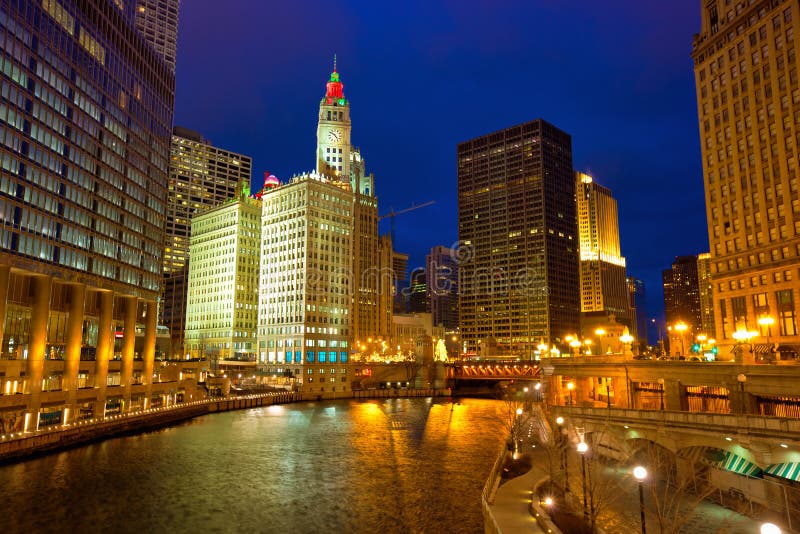 Chicago River Walk with lights and water reflections at dusk, IL, USA. Chicago River Walk with lights and water reflections at dusk, IL, USA