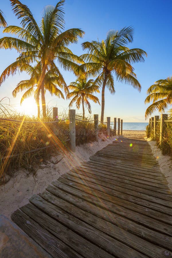 Passage to the beach at sunrise