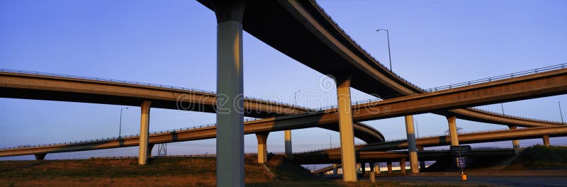 This is a freeway overpass intersection. It is the Interstate 10 & 15 in Los Angeles inSouthern California. The freeway criss-crosses over itself in several different directions. This is a freeway overpass intersection. It is the Interstate 10 & 15 in Los Angeles inSouthern California. The freeway criss-crosses over itself in several different directions.