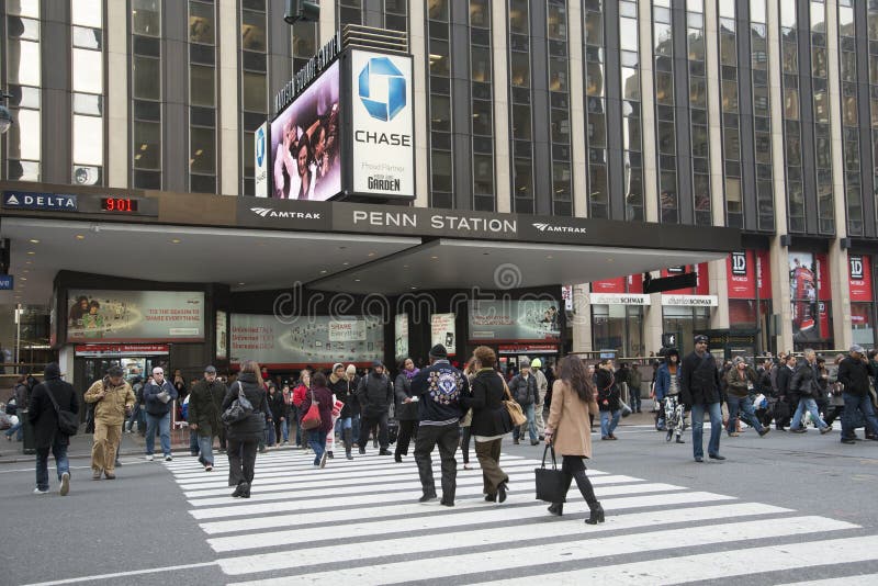 Penn Station at Madison Garden Square Manhattan New York USA Pedestrians crossing the road. Penn Station at Madison Garden Square Manhattan New York USA Pedestrians crossing the road