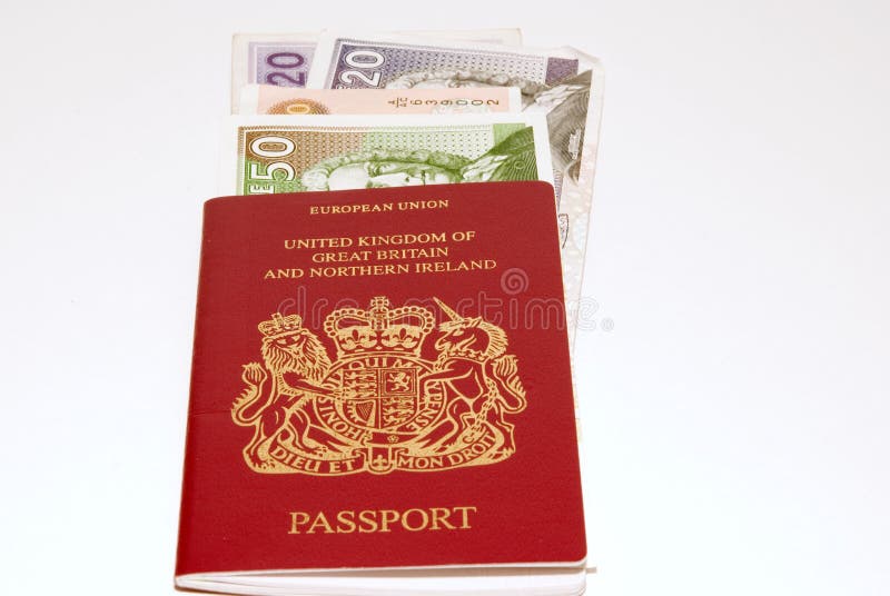 Red uk passport and british pound notes. Red uk passport and british pound notes