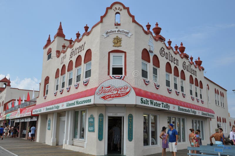 OCEAN CITY, NEW JERSEY - SEPTEMBER 1: Ocean City Boardwalk in New Jersey, as seen on September 1, 2013. The boardwalk is 2.5 miles long and one of the most well-known boardwalks in the world. OCEAN CITY, NEW JERSEY - SEPTEMBER 1: Ocean City Boardwalk in New Jersey, as seen on September 1, 2013. The boardwalk is 2.5 miles long and one of the most well-known boardwalks in the world.