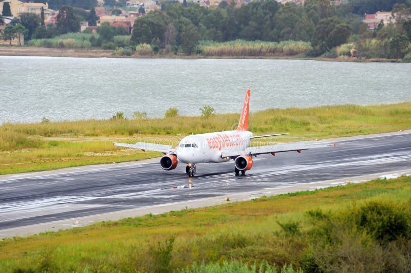 Passenger airplane landing to active runway