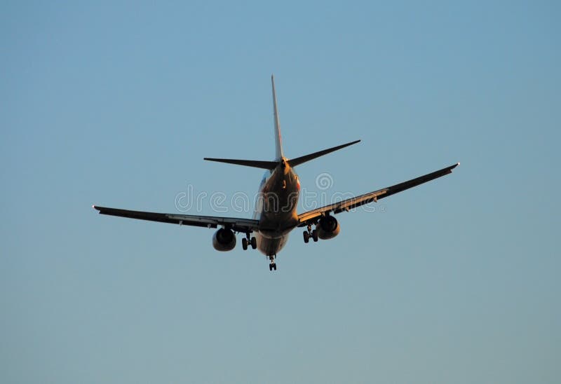 Passenger jet rear view stock image. Image of passenger 2409743