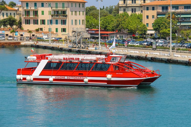 Passenger pleasure boat in Portoferraio harbour, view from the s royalty free stock photography Passenger pleasure boat in Portoferraio harbour, view from the s royalty free stock photography