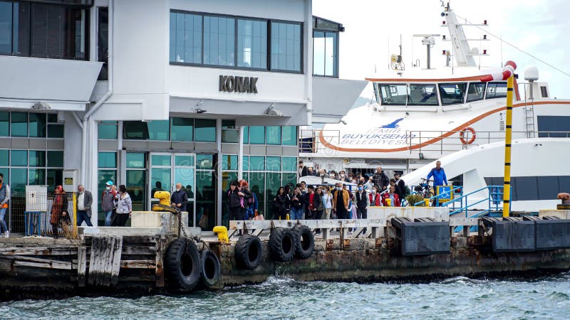 Passengers get off the ferry at the Konak Pier in Konak, Izmir, Turkey on April 3, 2022.