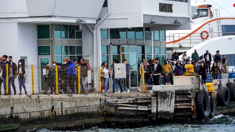 Passengers get off the ferry at the Konak Pier in Konak, Izmir, Turkey on April 3, 2022.