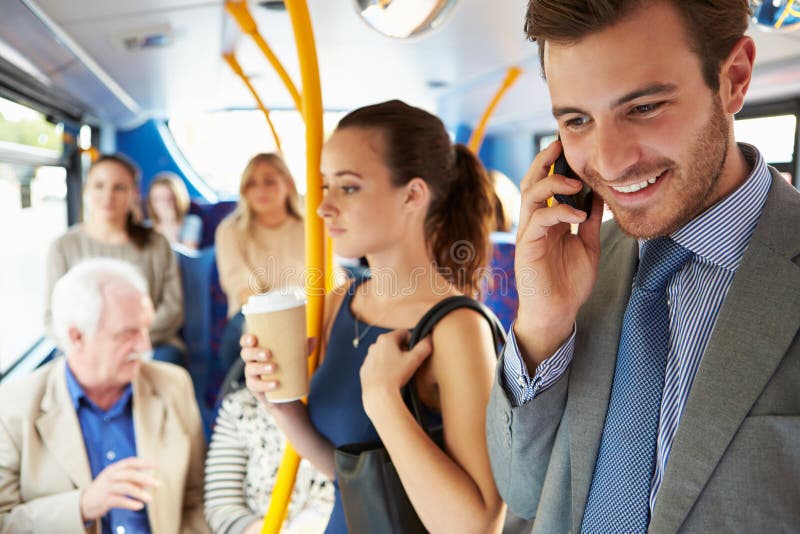 Passengers Standing On Busy Commuter Bus royalty free stock images Passengers Standing On Busy Commuter Bus royalty free stock images