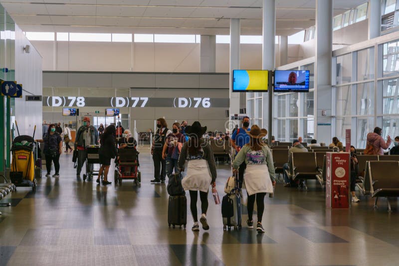 Passengers Waiting for Their Flights Inside Calgary International ...