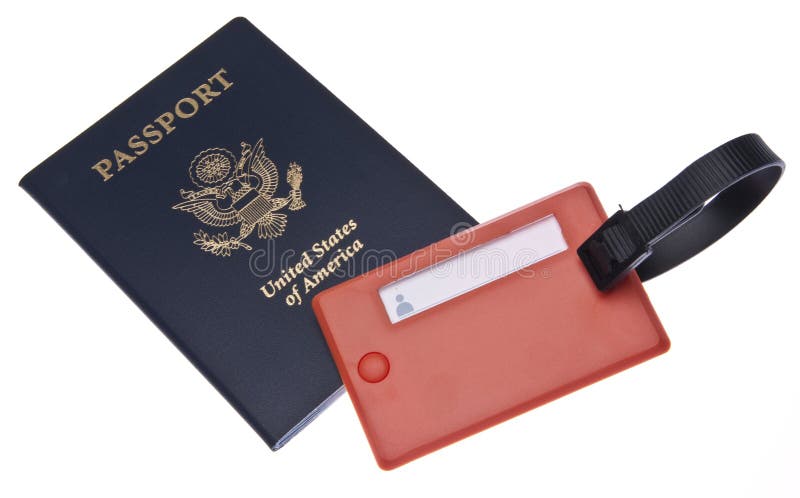 USA passport with bright orange luggage tag isolated on white with a clipping path. USA passport with bright orange luggage tag isolated on white with a clipping path.