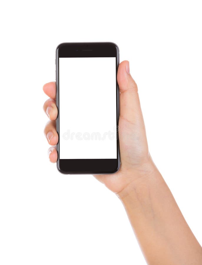 Passi a tenuta lo Smart Phone mobile con lo schermo in bianco isolato su wh