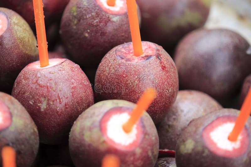 Passion fruit with straw stock image. Image of fruit 41239829