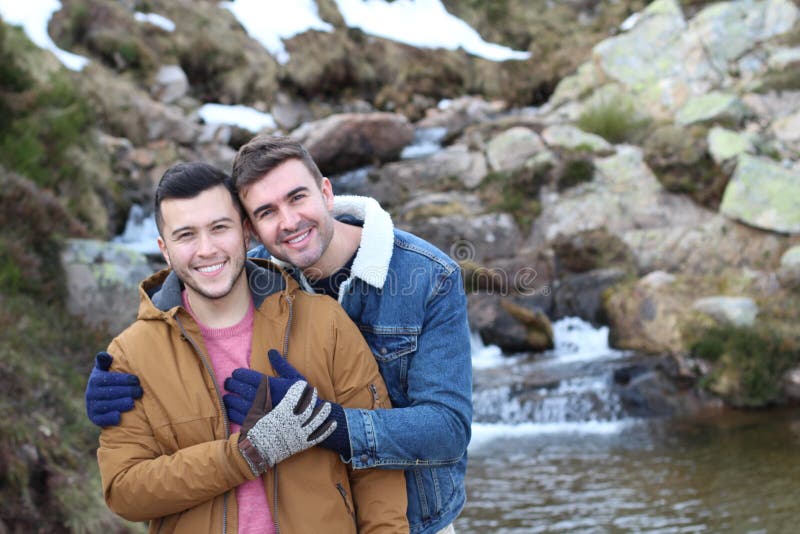 Passionate gay couple in winter setting. royalty free stock photography 