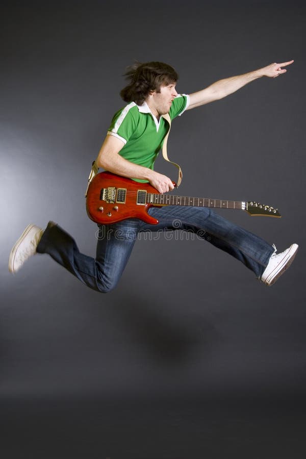 Passionate Guitarist Playing an Acoustic Guitar Stock Image Image of