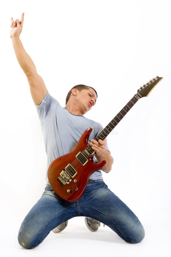 A Mature Adult Man Playing A Guitar Side View High