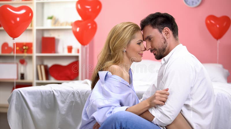 Passionate loving couple spending time together, touching foreheads, relations royalty free stock photo Passionate loving couple spending time together, touching foreheads, relations royalty free stock photo