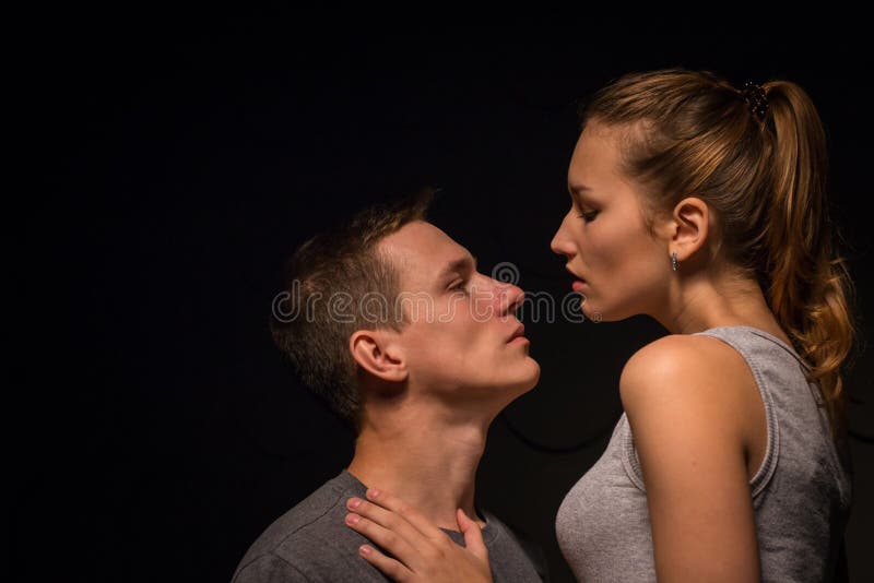 Passionate Young Couple in the Room Stock Image - Image of light, play