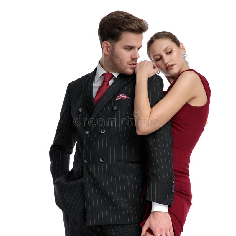 Passionerade par som är klätt elegant arkivfoto Passionerade par som är klätt elegant arkivfoto