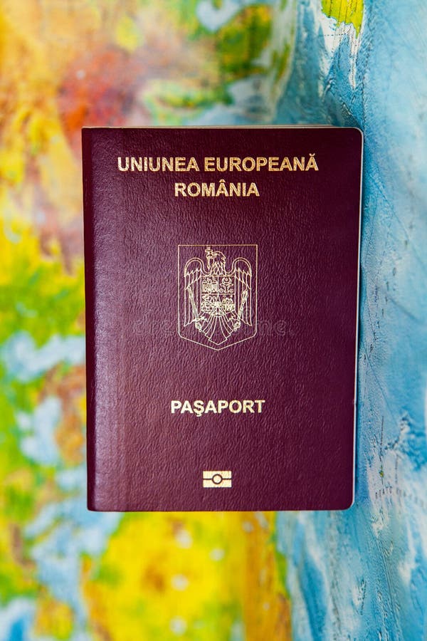 Passport on map. Travel to Europe Preparation for Traveling concept. An official passport of Romania stock photo Passport on map. Travel to Europe Preparation for Traveling concept. An official passport of Romania stock photo