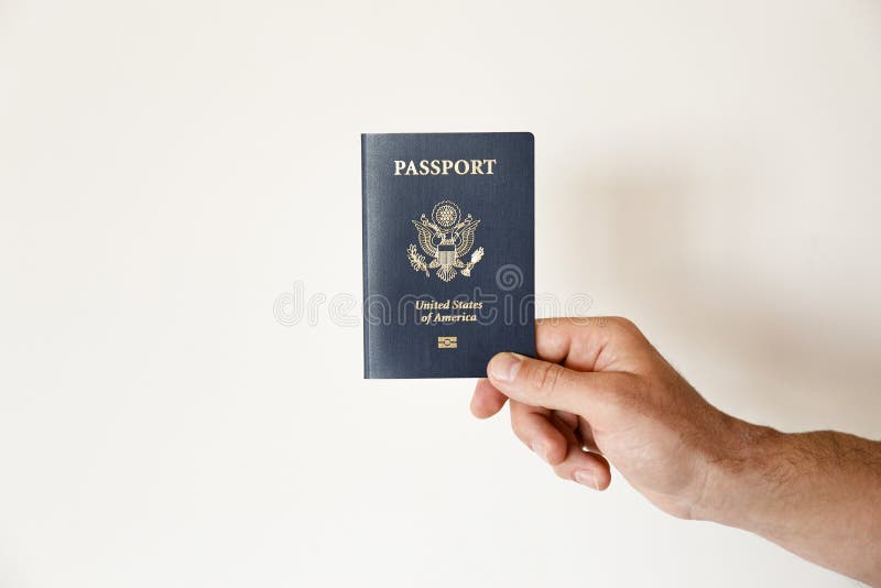 Passport Of The US Citizen. Identification Document Over Bright