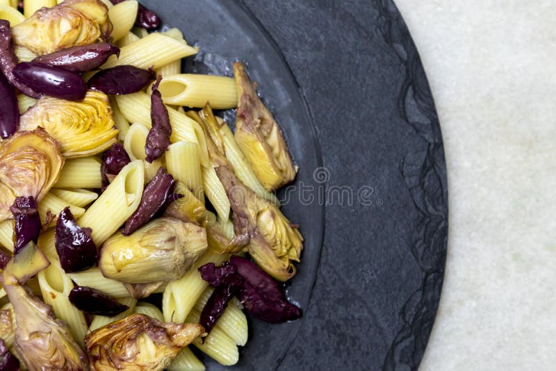 Pasta with Black Olives and Artichoke Hearts Stock Image Image of