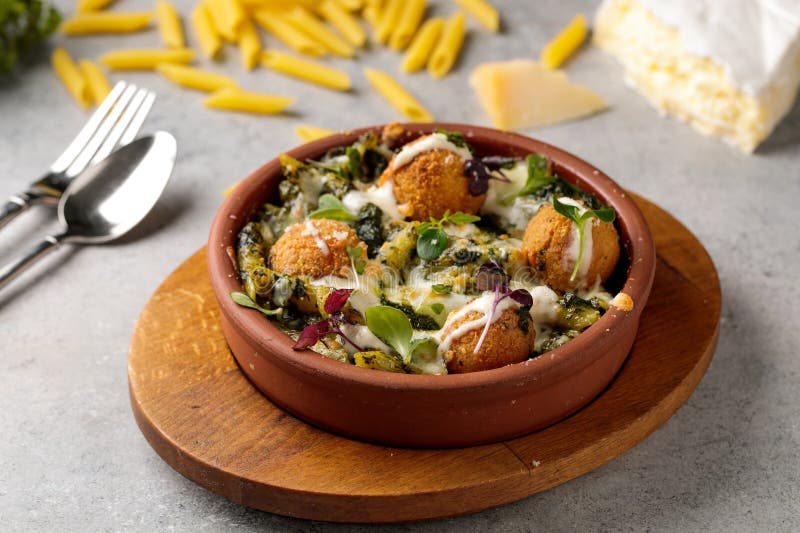 Pasta Brie with Balls Served in Dish Isolated on Table Top View of