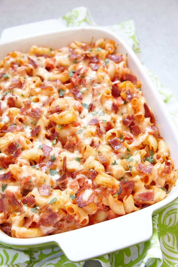 Pasta Casserole with Bacon, Ham, Cheese and Tomato Stock Photo Image