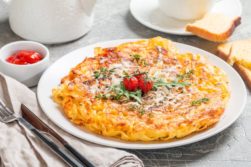 Pasta Casserole with Eggs, Sundried Tomato and Cheese Stock Photo